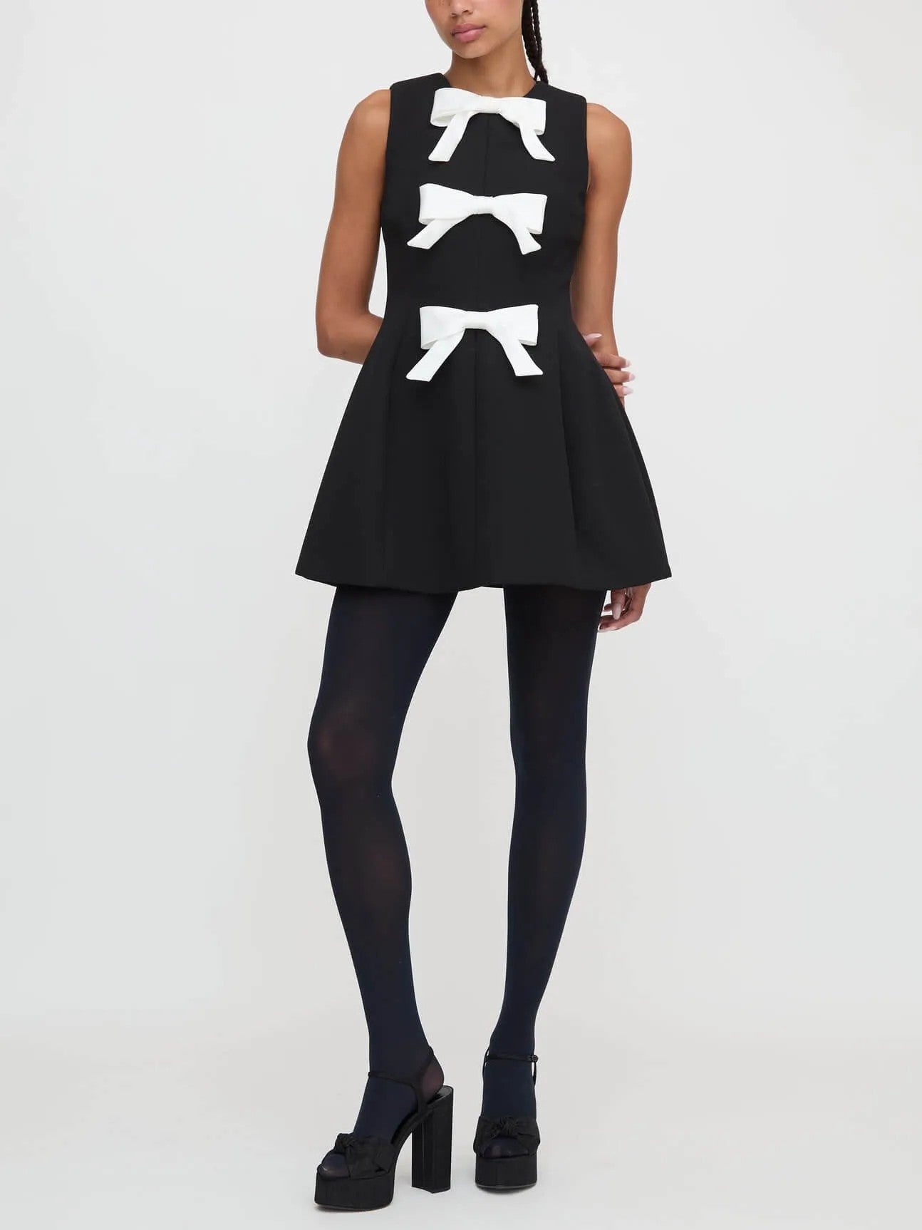 Bow Embellished Mini Dress | Chic & Playful | Elegant Statement