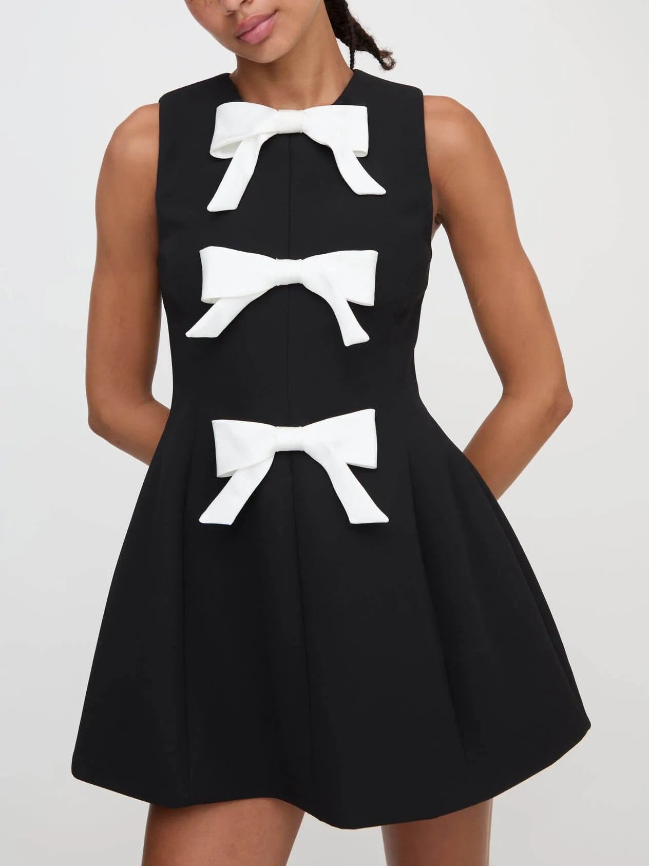 Bow Embellished Mini Dress | Chic & Playful | Elegant Statement