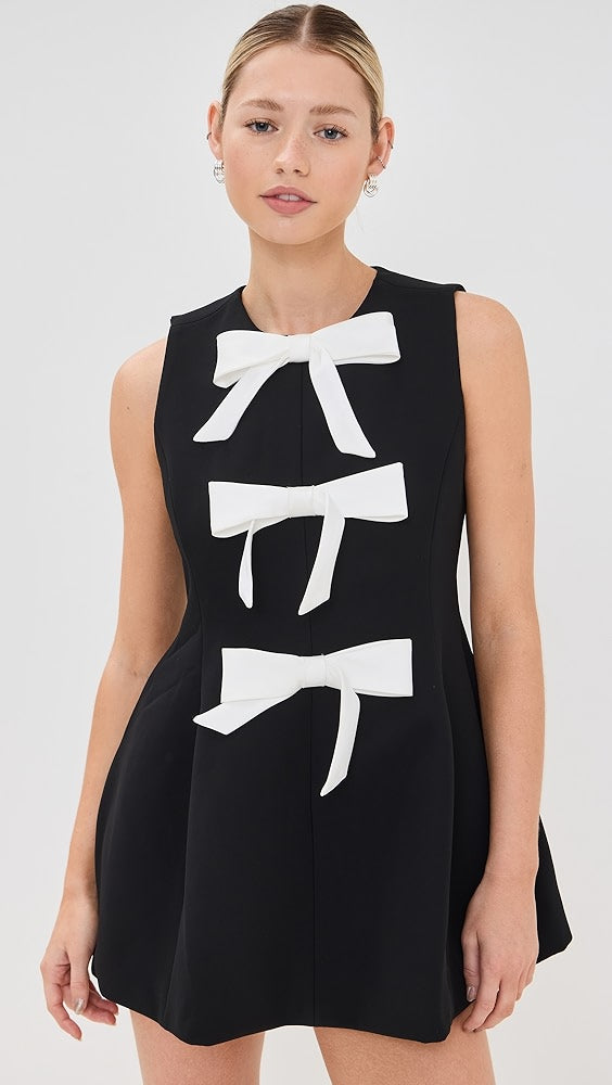 Bow Embellished Mini Dress | Chic & Playful | Elegant Statement